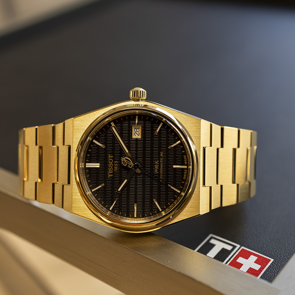 Kultainen Tissot PRX