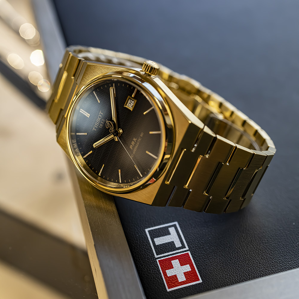 Kultainen Tissot PRX
